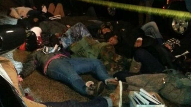 "We're just tired of waiting:" Dontre Hamilton supporters take message to D.A. Chisholm's front door