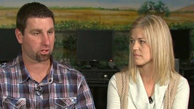 Brewers bullpen coach Marcus Hanel helps bring winter coats to kids