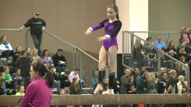 A huge gymnastics meet in the heart of downtown Milwaukee, sponsored by Hal's Harley-Davidson!