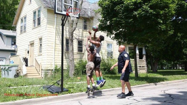 Anonymous donor helps replace basketball hoop stolen from spot where officers, kids play together