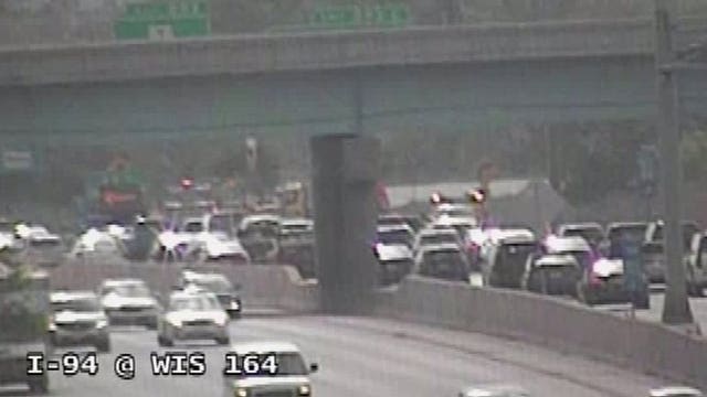 Traffic backed up for miles due to closure of ramp on 94 WB to Hwy 16 after road buckled