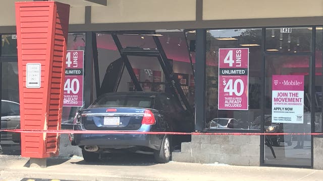 Person crashes vehicle into T-Mobile store in Milwaukee
