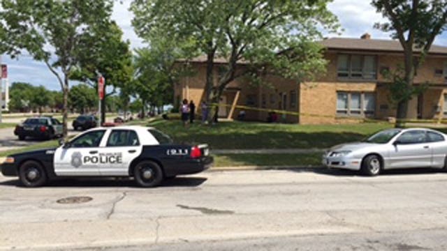 Police: 19-year-old woman struck by bullet fired from adjoining apartment into her unit