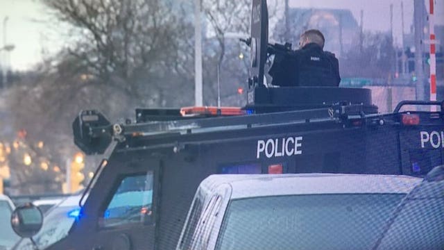 SWAT teams near 5th & Grant after suspect wanted in 'freeway shooting' tracked to home there