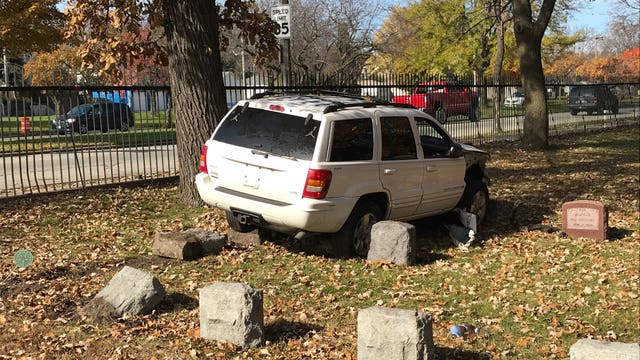 SUV crashes through fence at Forest Home Cemetery, dislodges gravestones