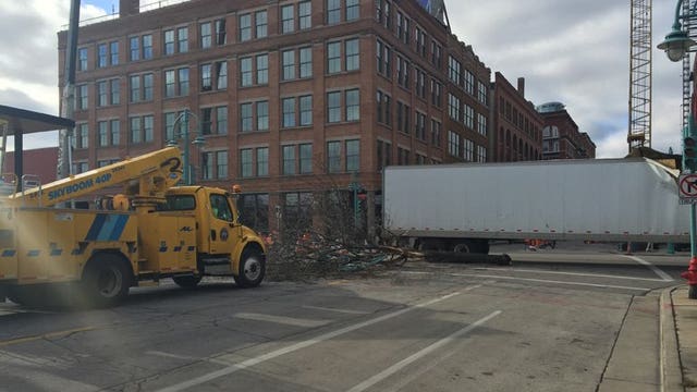 Semi strikes & drags tree, which then hit pole in Milwaukee's Historic Third Ward