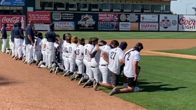Entire high school baseball team kneels during national anthem at 1st game of season