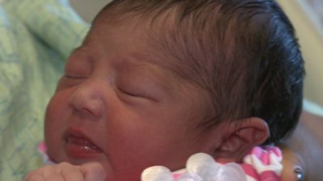 Officers deliver baby in front seat of vehicle during traffic stop