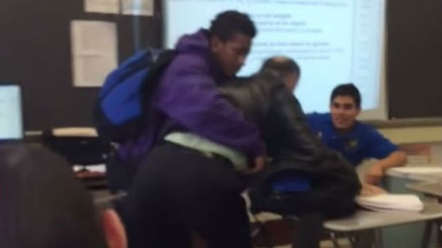 WATCH: Student slams teacher to the floor for allegedly taking phone away