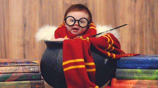 Baby dressed as Harry Potter poses for adorable photo shoot