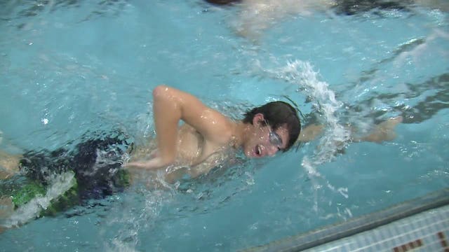 Oak Creek Senior Elliot Koss active in swimming, track & band