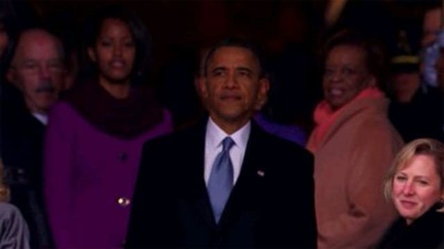 Sworn in again, Pres. Obama lingers for last look