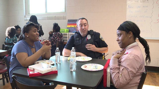 Hoping to serve up a lasting impact, Milwaukee police help host pizza party for city's youth