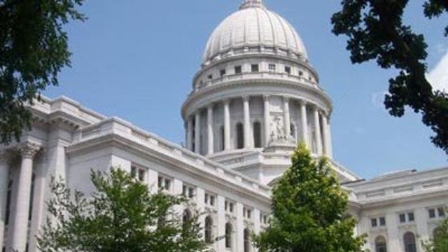 Governor Scott Walker signs asbestos bill opposed by veterans