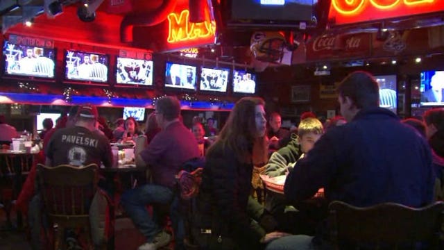 "When it's a game like this, it's all green and gold:" Milwaukee bars get set for big game