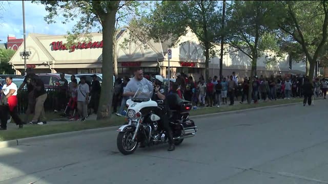 Dozens march Milwaukee streets to honor fallen Officer Michalski
