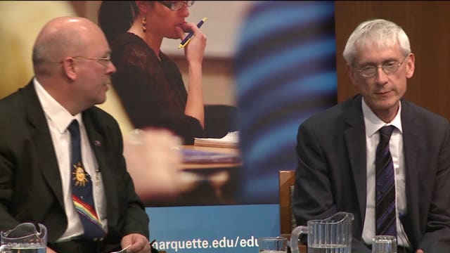 State superintendent debate gets awkward as incumbent clutches at his opponent's wrist