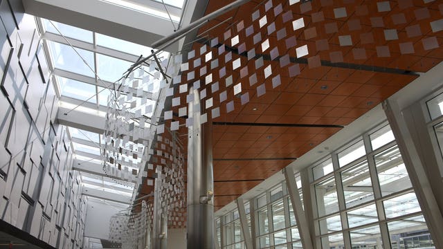 Public Art Committee dedicates "Slalom," new kinetic sculpture on display at airport's baggage claim