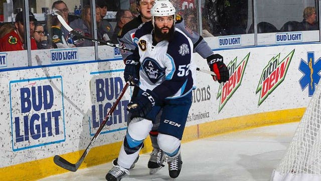 Ads earn must-need win over IceHogs, 5-2