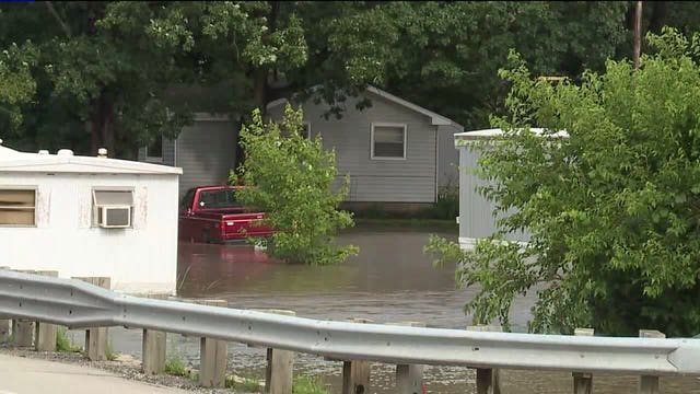 "A swimming pool:" 8 people, 2 dogs evacuated from Kenosha Co. mobile home park due to flooding