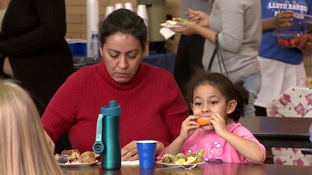 Lloyd Barbee Montessori School students bring "someone they love" to school on Valentine's Day