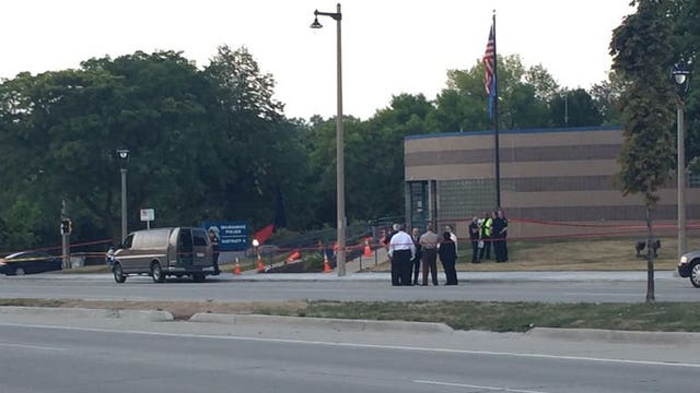 Man seated in van fatally shoots passerby outside District 6 police station, turns himself in