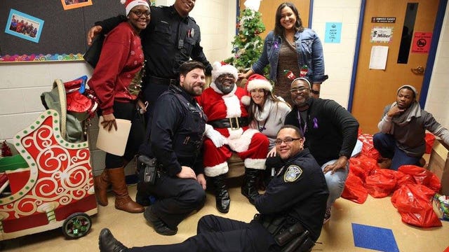 Celebrating with the neighbors they serve: MPD's District 7 hosts holiday party for residents