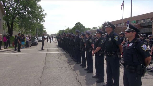 Out in force: MPD conducts roll call in the street as some celebrate the end of the school year