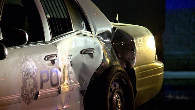 'Reckless at this intersection:' 2 officers hurt after squad struck by vehicle, driver in custody