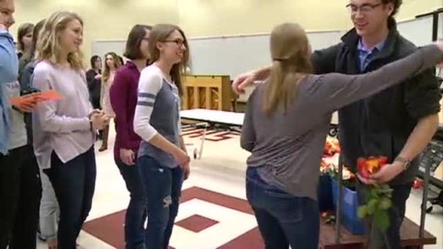 Holmen senior spends nearly $500 to buy Valentine's roses for EVERY girl in his school, staff included!