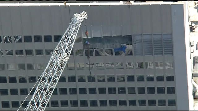 10 injured after piece of mechanical equipment being lifted by crane broke free in Manhattan