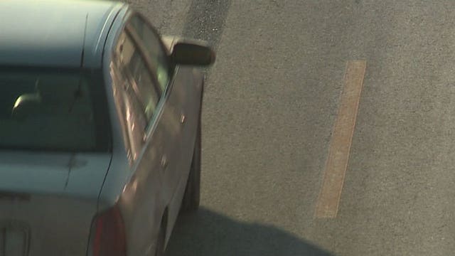 Are they working? Motorists in Milwaukee the first in the country to be exposed to orange lane markings