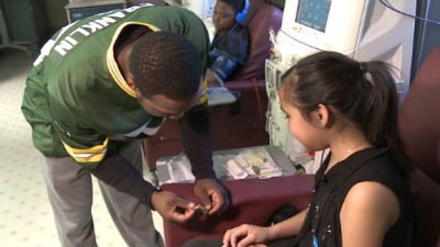 Packers players visit sick children at Children's Hospital