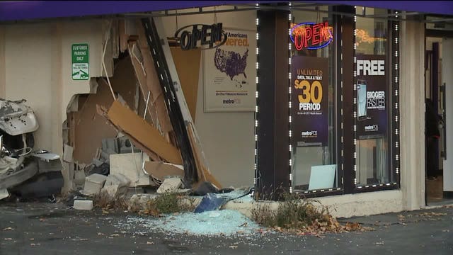 Police: Truck strikes Metro PCS store near 55th & Center, another vehicle in the parking lot