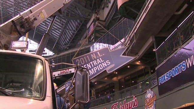 Brewers install 2011 Central Division pennant at Miller Park