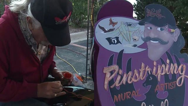 'I could do that:' Pin-striping mural artist has painted Harley-Davidson motorcycles across the country