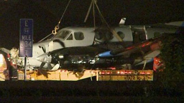 Pilot, passenger identified in plane crash onto I-94, 911 calls released