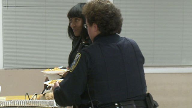 "To strengthen the ties:" Police officers, residents sit down for early Thanksgiving dinner