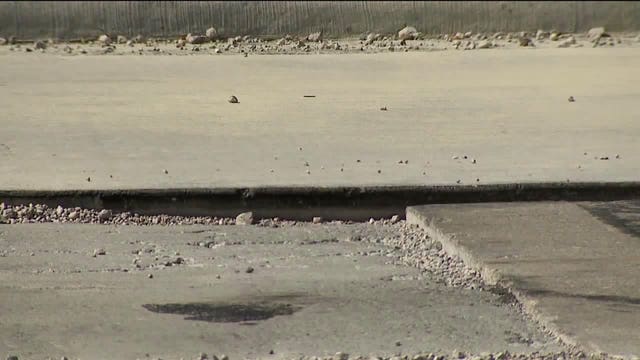 "At least 3 cars after mine got a flat:" Driver warns others about pothole problem in Waukesha County