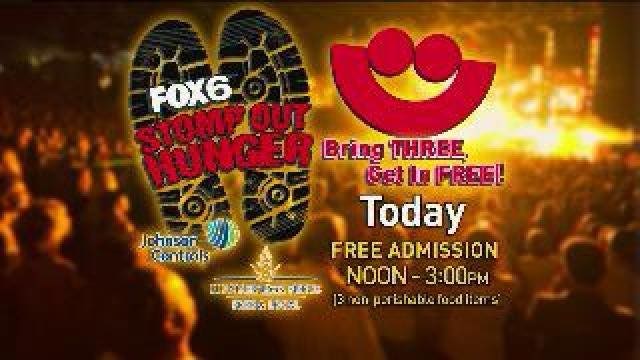 Laura gets details on Stomp Out Hunger at Summerfest