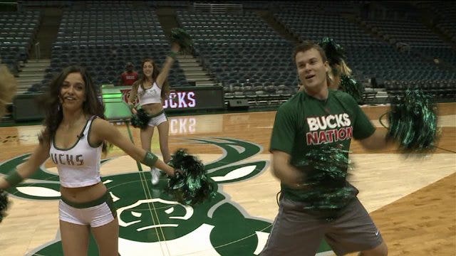 Chip hangs with the crew that provides entertainment when the Bucks play