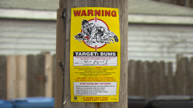 A sick joke? Posted signs liken homeless population to rats