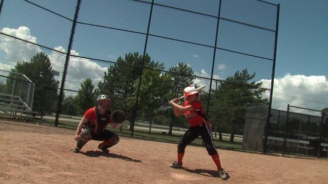 Maddy Faller travels all over the country playing softball