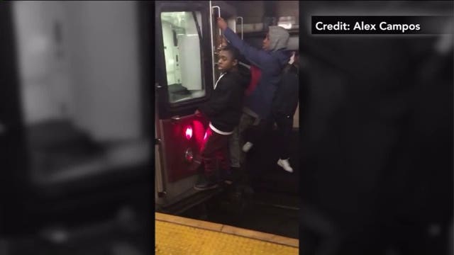 Video shows teens ‘subway surfing’ behind packed New York City train