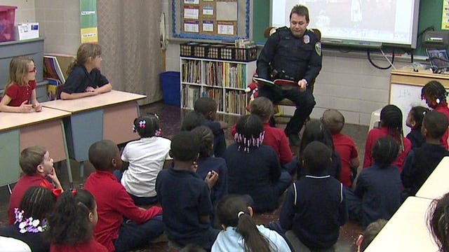 Officer surprises students at Milwaukee's Northwest Catholic School, see why
