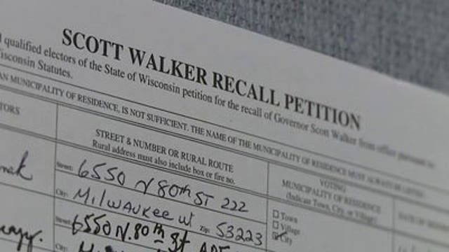 Threatening recall Walker message at low-income housing complex