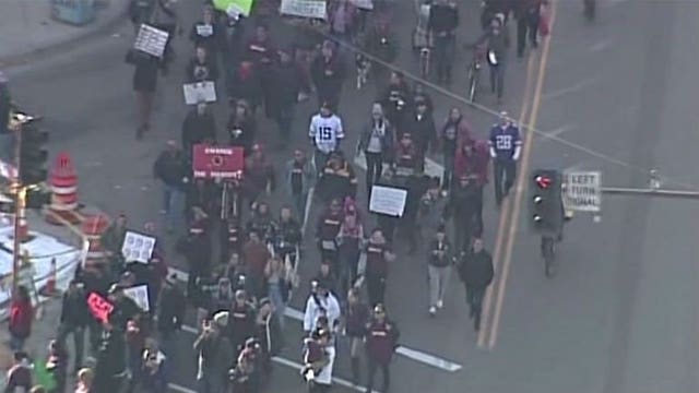 Thousands rally against Washington's nickname outside TCF Bank Stadium ahead of Redskins-Vikings game