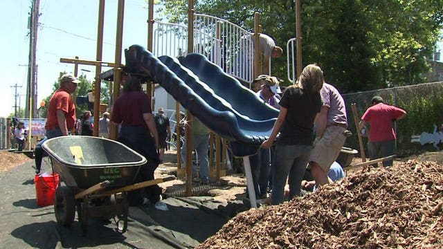 They came, they built, they played! Volunteers rehab a Milwaukee playground in just six hours!