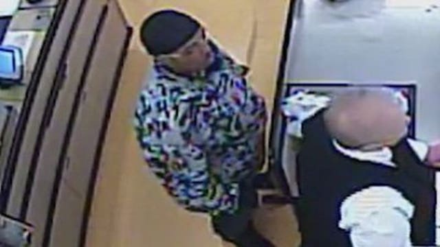 Cash grab: Armed robber rips money from cashier's drawer