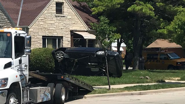 Rollover crash ends in front yard of home near 27th and Villard in Milwaukee